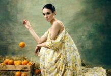 Лето, солнце и сиеста Девушка в пышном платье и с апельсинами