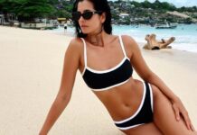 Тренды сезона: в отпуск или в ЗАГС? Девушка в темном купальнике