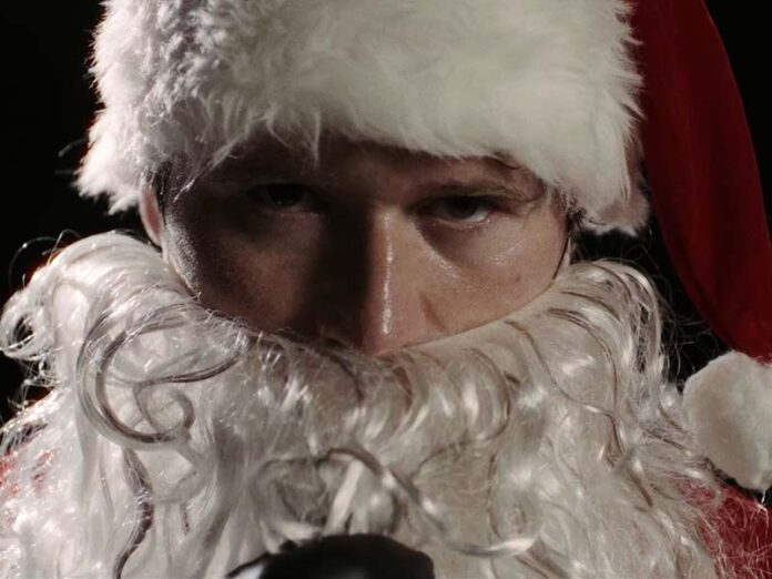 Роэн Кэмпбелл в роли Санта Клауса